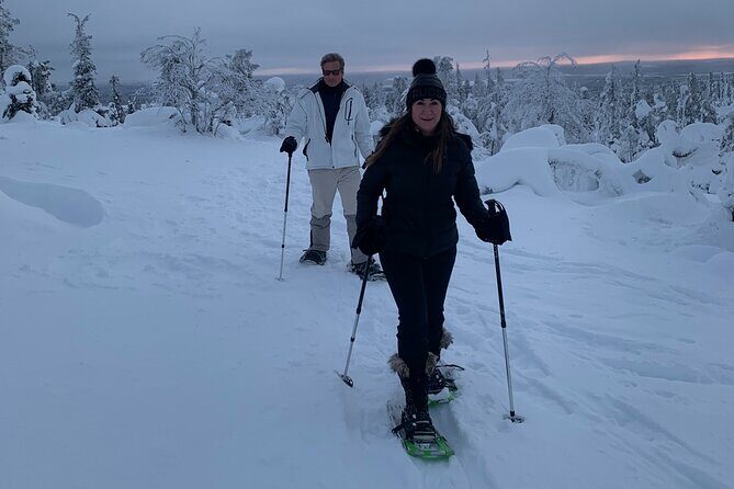 Arctic Reindeer Farm Experience with Snowshoeing in the Wild - Campfire sausages and handmade sweets in a cozy real cabin
