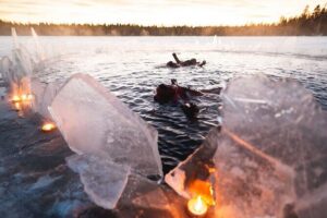 Daytime Arctic Ice-Floating in Rovaniemi, Small-Group - Entering The Suit: How the Guide Controls Comfort
