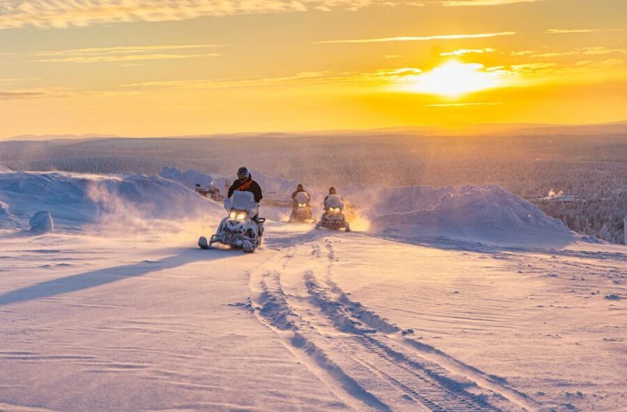 From Rovaniemi: Guided Lapland Snowmobile Adventure - The route: Taiga forests, frozen terrain, hilltop views, and photo stops