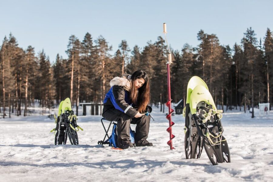 From Rovaniemi: Snowshoeing and Ice Fishing Tour - Ice Fishing Setup: Drilling, Individual Spots, and Patience