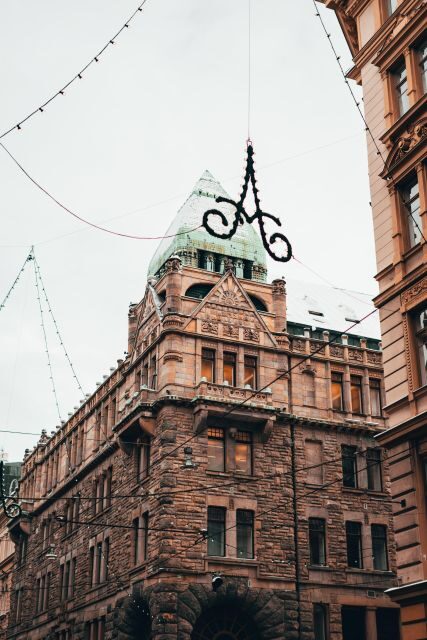 Helsinki: Architecture Walking Tour with Expert - JugendHall, Pohjola Insurance Building, and the Academic Bookstore: Style Lessons in Real Blocks