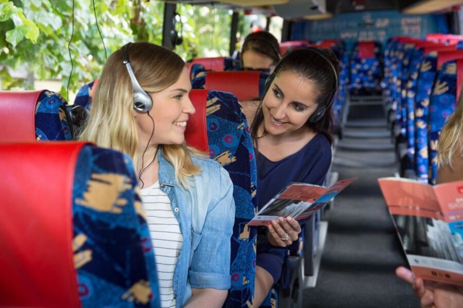 Helsinki: Bus Tour with Audio Guide - Boarding Stromma’s red bus by Helsinki Cathedral