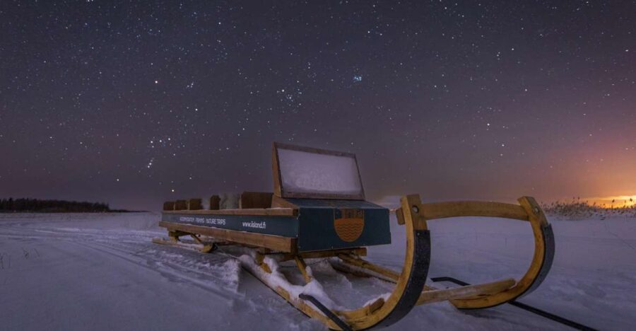 Ii: Snowmobile sleigh trip on frozen sea under starlit sky - Ii’s Frozen-Sea Night Sky: Why the Stars Look Different