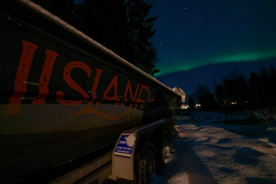 Ii: Snowmobile sleigh trip on frozen sea under starlit sky - Northern Lights Hunting Without the Rush