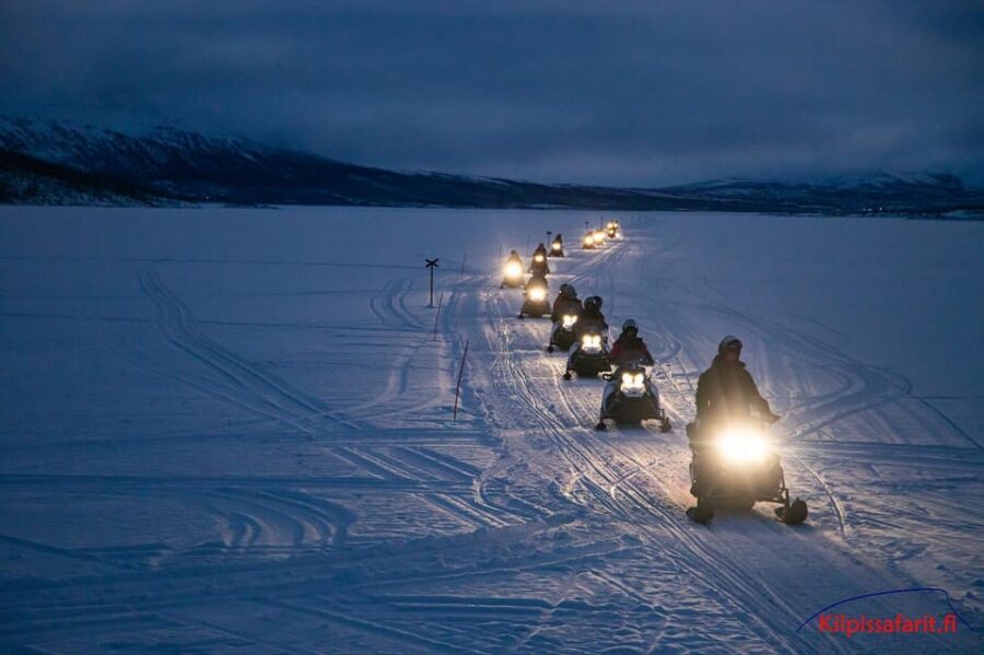 Kilpisjärvi: Border of Three Countries Snowmobile Safari - Koltavuoma and the yellow three-country cairn stop: the photo moment