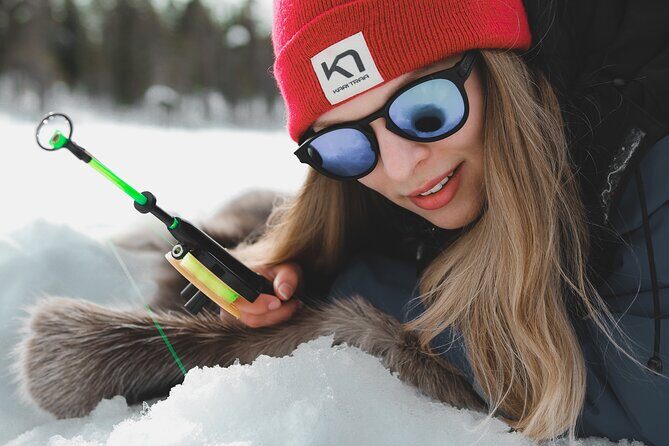 Lappish Lunch Break -Snowmobiling, ice fishing and tasty food - Safartica Meet Point: Gear Up and Learn the Snowmobile Fast