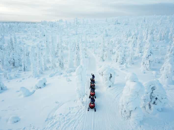 Levi: Easy Snowmobile Safari into the Nature - The Route Experience: Frozen Lakes, White Forest, and Regrouping Stops