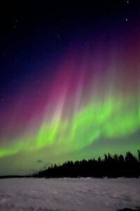 Levi: Northern Lights in Peace and Privacy - by Private Lake - Watching the auroras on a frozen lake: reindeer hides and long sky time