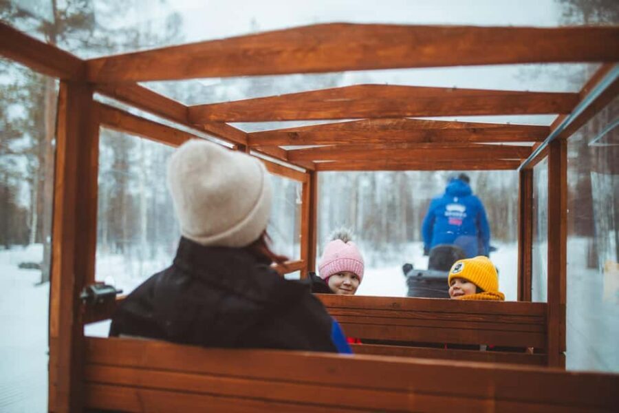 Rovaniemi: Family Snowmobiling Trip - Heated sled comfort for kids: simple, warm, and guide-led
