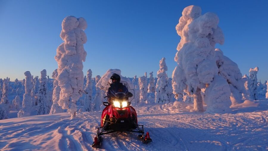 Saariselkä: Evening Snowmobile Tour with Fire & picnic - Saariselkä pickup to cold-ready gear