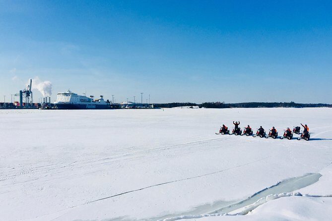 Snowmobile Safari in Helsinki Archipelago with Lunch - Senate Square pickup and getting kitted up in winter gear